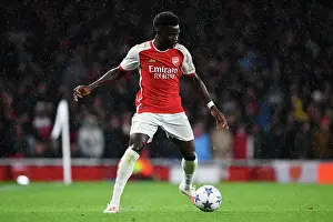 Arsenal V PSV Eindhoven 2023-24 Prints: Arsenal vs PSV Eindhoven: Bukayo Saka in Action - UEFA Champions League 2023/24