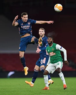 Images Dated 3rd December 2020: Arsenal vs Rapid Wien: Tense Moment as Cedric Soares Clears Ball in UEFA Europa League Clash