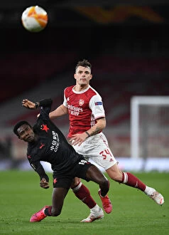 Images Dated 8th April 2021: Arsenal vs Slavia Prague: Granit Xhaka Clashes in Empty Europa League Quarterfinal