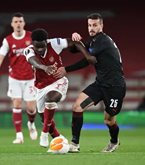 Arsenal vs Slavia Praha: Bukayo Saka in Action at Empty Emirates Stadium - UEFA Europa League Quarterfinal