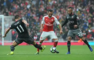 Arsenal V Southampton 2016-17 Prints: Arsenal vs Southampton: Cazorla vs Tadic and Redmond - Intense Clashes in the 2016-17 Premier League Showdown