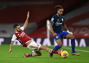 Arsenal V Southampton 2020-21 Prints: Arsenal vs Southampton: Ceballos Tackles Walcott in Intense Premier League Clash