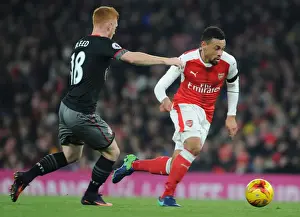 Arsenal V Southampton EFL Cup 2016-17 Prints: Arsenal vs. Southampton: Coquelin Clashes with Reed in EFL Cup Quarter-Final
