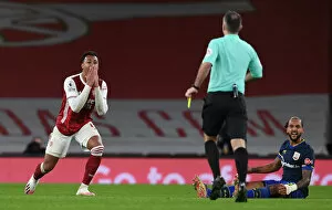Images Dated 16th December 2020: Arsenal vs Southampton: Gabriel Magalhaes Contemplates Referees Decision