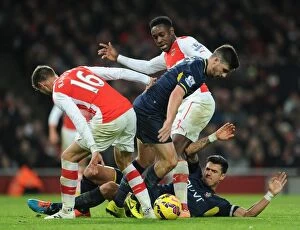 Images Dated 3rd December 2014: Arsenal vs. Southampton: Intense Battle Between Ramsey, Welbeck, Long, and Fonte (2014-15)