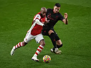 Arsenal V Southampton 2021-22 Prints: Arsenal vs. Southampton: Lacazette Faces Off Against Bednarek in Premier League Clash