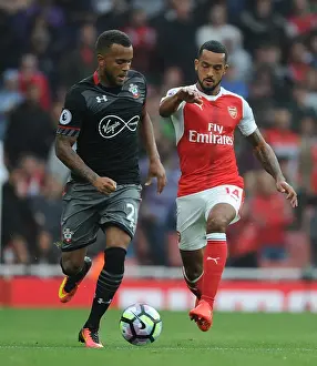 Arsenal V Southampton 2016-17 Prints: Arsenal vs Southampton: Walcott vs Bertrand - Premier League Battle at Emirates Stadium