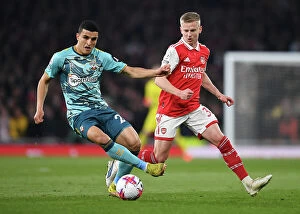 Images Dated 22nd April 2023: Arsenal vs Southampton: Zinchenko and Elyounoussi Face Off in Premier League Clash