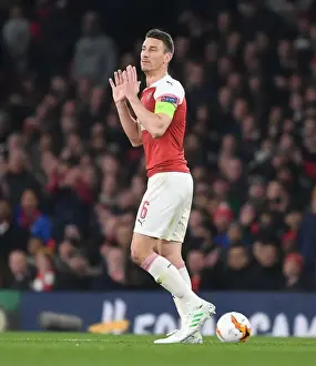 Arsenal vs. S.S.C. Napoli: Laurent Koscielny in Europa League Quarterfinal Action at Emirates Stadium