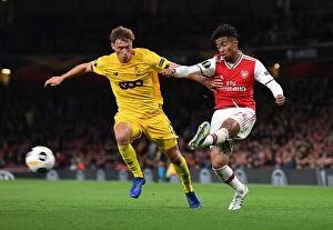 Arsenal v Standard Liege 2019-20 Collection: Arsenal vs Standard Liege: Nelson vs Vojvoda in Europa League Clash at Emirates Stadium