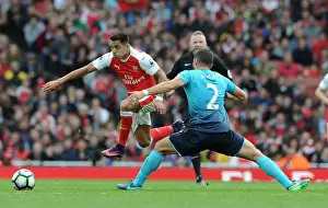 Arsenal V Swansea City 2016-17 Prints: Arsenal vs Swansea City: A Battle Between Alexis Sanchez and Jordi Amat (2016-17)
