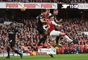 Arsenal V Swansea City 2017-18 Prints: Arsenal vs Swansea: Koscielny and Mertesacker Clash with Fernandez and Mawson