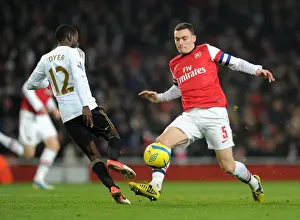 Arsenal V Swansea - FA Cup 3rd Rd Replay 2012-13 Prints: Arsenal vs Swansea: Thomas Vermaelen Tackles Nathan Dyer in FA Cup Third Round Replay