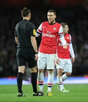 Arsenal v Swansea 2012-13 Collection: Arsenal vs Swansea: Vermaelen Confronts Referee during 2012-13 Premier League Clash