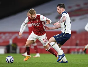 Arsenal V Tottenham Hotspur 2020-21 Prints: Arsenal vs. Tottenham: Martin Odegaard Clashes with Pierre-Emile Hojbjerg in Intense Premier League Showdown