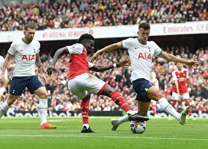 Arsenal vs. Tottenham: Bukayo Saka Faces Off Against Ivan Perisic in the 2022-23 Premier League Clash at Emirates Stadium