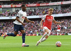 Arsenal vs. Tottenham Clash: Martin Odegaard vs. Destiny Udogie at Emirates Stadium (2023-24)