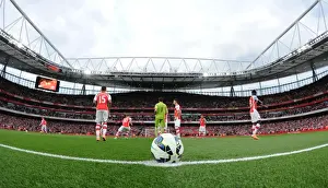 Arsenal vs. Tottenham: Emirates Stadium Rivalry - Premier League 2014-15: A Glimpse into the Intense Atmosphere at Arsenal's Emirates Stadium during the Battle between Arsenal and Tottenham