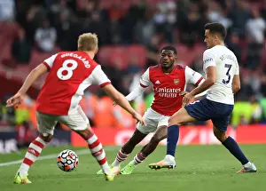 Arsenal V Tottenham Hotspur 2021-22 Prints: Arsenal vs. Tottenham: Intense Battle - Maitland-Niles vs