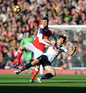 Arsenal V Tottenham Hotspur 2016-17 Prints: Arsenal vs. Tottenham: Koscielny vs. Son - A Premier League Rivalry Clash (2016-17)