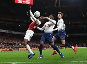 Arsenal V Tottenham Hotspur Carabao Cup 2018-19 Prints: Arsenal vs. Tottenham: Maitland-Niles Faces Off Against Rose and Alli in Carabao Cup Quarterfinal Showdown