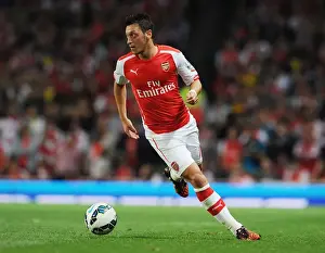 Arsenal V Tottenham Hotspur 2014-15 Prints: Arsenal vs. Tottenham: Mesut Ozil in Action at the Emirates Stadium (2014-15)