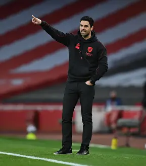 Arsenal vs. Tottenham: Mikel Arteta Leads the Gunners in Empty Emirates Stadium