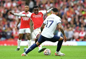 Arsenal V Tottenham Hotspur 2023-24 Prints: Arsenal vs. Tottenham: Nketiah Passes the Ball in the 2023-24 Premier League Clash at Emirates Stadium