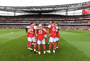Arsenal vs. Tottenham: Pre-Match Huddle in the Premier League, London 2022