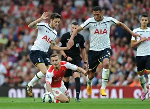 Arsenal V Tottenham Hotspur 2014-15 Prints: Arsenal vs. Tottenham: Wilshere Tripped by Mason and Capoue in Intense Premier League Clash