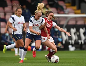 Arsenal Women V Tottenham Hotspur Women - FA Cup 2020-21 Prints: Arsenal vs. Tottenham Women's FA Cup Clash: Evans vs. Peplow Battle at Meadow Park