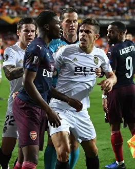 Valencia CF V Arsenal 2018-19 Prints: Arsenal vs Valencia: Europa League Semi-Final Clash - Ainsley Maitland-Niles vs Gabriel