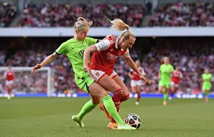 Arsenal Women V Vfl Wolfsburg 2022-23 Prints: Arsenal vs. VfL Wolfsburg: A Battle for Possession in the UEFA Women's Champions League Semifinal