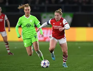 VfL Wolfsburg V Arsenal Women 2021-22 Prints: Arsenal vs. VfL Wolfsburg: A Battle in the UEFA Women's Champions League Quarterfinals
