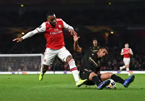 Arsenal vs. Vitoria Guimaraes: Lacazette Tackled in Europa League Clash