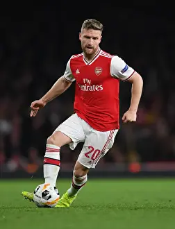 Arsenal V Vitoria Club 2019-20 Prints: Arsenal vs. Vitoria Guimaraes: Mustafi in Action - UEFA Europa League 2019-20