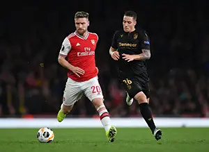 Arsenal V Vitoria Club 2019-20 Prints: Arsenal vs. Vitoria Guimaraes: Mustafi Clashes with Duarte in Europa League Showdown