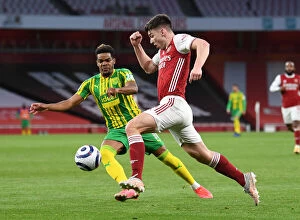 Images Dated 9th May 2021: Arsenal vs. West Bromwich Albion: Tierney in Action at Empty Emirates Stadium, May 2021