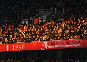 Images Dated 8th December 2012: Arsenal vs. West Bromwich Albion: Passionate Arsenal Fans at Emirates Stadium
