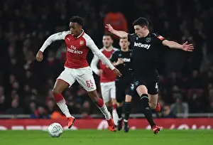 Arsenal V West Ham United - Carabao Cup 2017-18 Prints: Arsenal vs. West Ham: Clash between Joe Willock and Declan Rice in Carabao Cup Quarterfinal