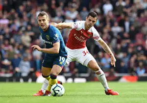 Arsenal V West Ham United 2018-19 Prints: Arsenal vs. West Ham: Clash of Midfield Titans - Xhaka vs. Wilshere