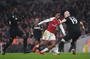 Arsenal V West Ham United - Carabao Cup 2017-18 Prints: Arsenal vs. West Ham: Clash between Willock and Obiang in Carabao Cup Quarterfinal