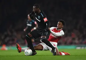 Arsenal V West Ham United - Carabao Cup 2017-18 Prints: Arsenal vs. West Ham: Clash of Willocks and Obiang in Carabao Cup Quarterfinal