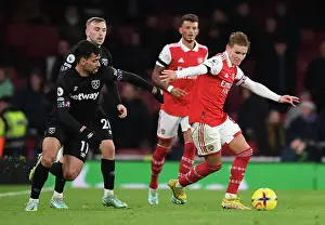 Arsenal vs. West Ham: Martin Odegaard Clashes with Lucas Paqueta in Premier League Showdown (December 2022)
