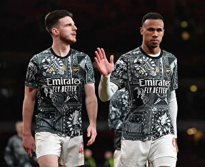 Arsenal v West Ham United 2023-24 Collection: Arsenal vs West Ham: Pre-Match Warm-Up, Arsenal's Gabriel Magalhaes and West Ham's Declan Rice