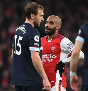 Arsenal V West Ham United 2021-22 Prints: Arsenal vs. West Ham United: Lacazette and Dawson Clash in Premier League Showdown
