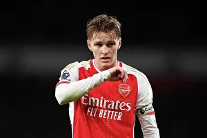 Arsenal V West Ham United 2023-24 Prints: Arsenal vs. West Ham United: Martin Odegaard's Intense Stare at Emirates Stadium (2023-24)