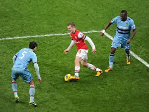 Arsenal vs. West Ham: Wilshere Clashes with Tomkins and Demel