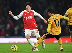 Arsenal vs. Wolverhampton Wanderers: Tomiyasu vs. Hwang Hee-Chan - A Premier League Battle at Emirates Stadium (2023-24)