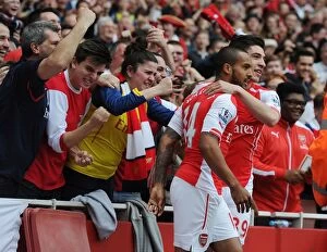 Arsenal v West Bromwich Albion 2014/15 Collection: Arsenal: Walcott and Bellerin Celebrate First Goal Against West Brom (2014/15)